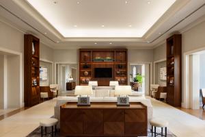 a living room with a couch and a table at Grand Nikko Tokyo Daiba in Tokyo