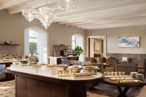 a lobby with a table with food on it at Grand Nikko Tokyo Daiba in Tokyo +103 photos