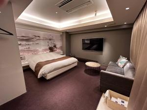 gull HOTEL tesisinde bir odada yatak veya yataklar