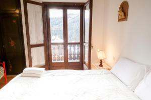 Katil atau katil-katil dalam bilik di Casa Remo Duplex by Welc(H)ome