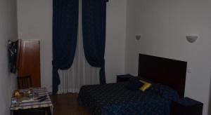 TV o dispositivi per l'intrattenimento presso Incantoromano guest house