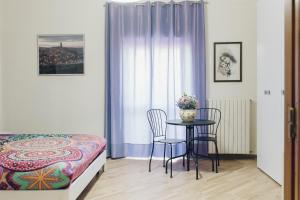 Postel nebo postele na pokoji v ubytování Il Fiore dei Sassi