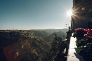 a view of the grand canyon from a balcony at Il Fiore dei Sassi in Matera