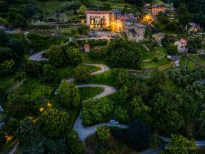 an aerial view of a town at night at Rustico Verginate in Bellano