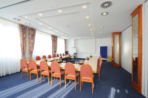 Zona de afaceri și/sau sala de conferințe de la Hotel Poinger Hof