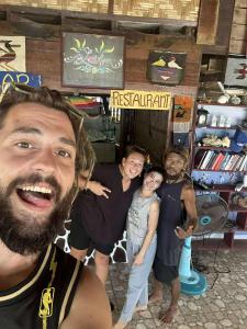 a group of people posing for a picture at Island Life Bungalows in Ko Khan