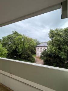 a view of a house from a balcony at City Apartment in Lörrach