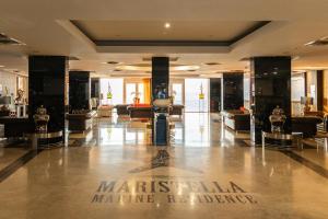 a large lobby with couches in a building at Blu Mare Residense in Odesa +75 photos