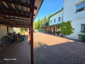 a group of bikes parked next to a building at Bike Hostel&Camp in Przewóz