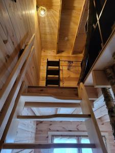 a view of the stairs in a tiny house at Le chalet caché, au pied des Chambarans in Saint-Siméon-de-Bressieux
