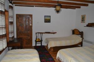 Tempat tidur dalam kamar di Villa Dihovo