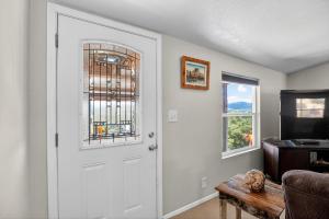 a room with a white door and a window at Tehachapi 12-Guest Group Escape home in Tehachapi