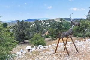 a statue of a giraffe on top of a hill at Tehachapi 12-Guest Group Escape home in Tehachapi