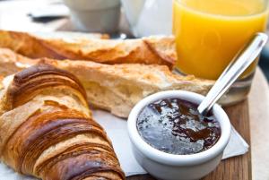 a plate of food with bread and a bowl of dips at Maison Liparlati in Positano