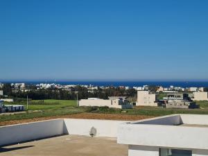 a view of a city from the top of a building at Casa hersi in Hennchir Ksar Rhaleb