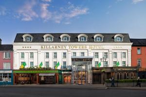 a large white building with a library towers hotel at Killarney Towers Hotel & Leisure Centre in Killarney