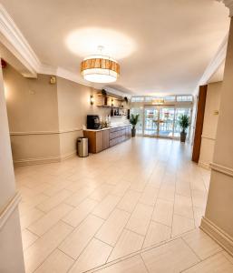 a large lobby with a large tile floor at Best Western Kincardine in Kincardine