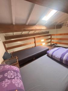 a room with two beds in a room at La Fratta Art - House in Marsciano +95 photos