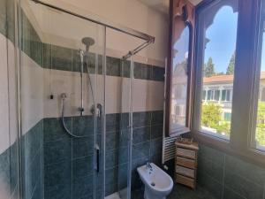 a bathroom with a shower and a sink at B&B Firenze 400 in Florence +88 photos
