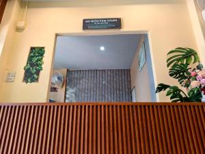 a sign that reads do not walk your way home at Happy Homey Hostel in Suratthani