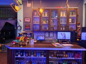 a bar in a room with lots of bottles at Shree Muktinath Hotel in Pokhara