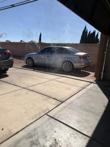 a silver car parked in a parking lot at EdCccc life in Las Vegas