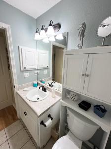 a bathroom with a sink and a toilet and a mirror at La SeaEsta in Navarre +40 photos