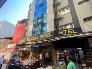 a sign for a book store in front of a building at Elizim Otel in İzmir