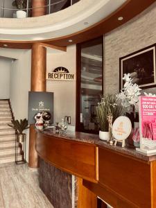 a lobby with a reception counter in a hotel at Hotel Dabi Imperial in Donji Štoj +71 photos