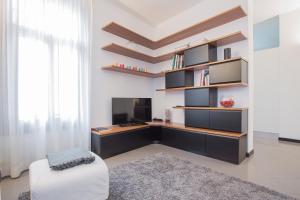 TV o dispositivi per l'intrattenimento presso Filodrammatici Loft by Welc(H)ome