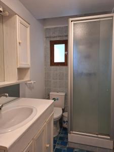 a bathroom with a sink and a toilet and a shower at Ô Cottage La Barre Ormesson - 20 min Paris in Deuil-la-Barre +38 photos
