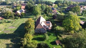 an aerial view of a house in a village at Krusenhofilona in Krusendorf
