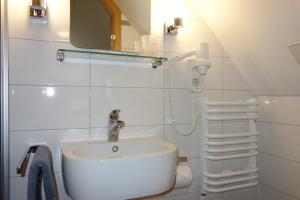 Koupelna v ubytování Hotel Gode Wind