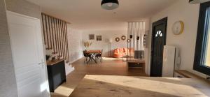 a hallway with a living room and a dining room at quiet house in Nogent-sur-Eure