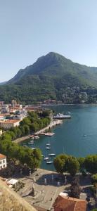 a view of a harbor with boats in the water at Casina Rossa in Ballabio