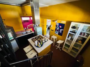 an overhead view of a kitchen with a small island at BAD - B&B And Design in Catania