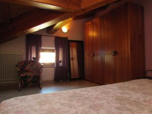 Postel nebo postele na pokoji v ubytování Residence Du Chateau