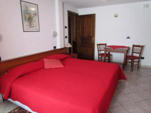 Postel nebo postele na pokoji v ubytování Residence Du Chateau
