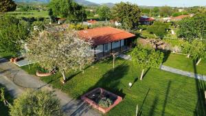 an overhead view of a house with an orange roof at Green Yard House in Alexandroupoli