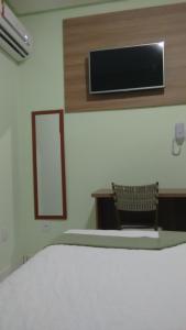 Postel nebo postele na pokoji v ubytování Domus Hotel Trindade - Canaã dos Carajás