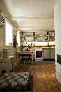 a kitchen with a table and a counter top at Vaktahouse in Reykjavík