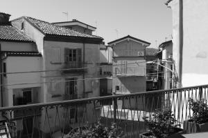 a black and white photo of a city with buildings at Casa Vacanza del Palio 2 in Nizza Monferrato