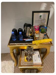 a wooden table with a tray of items on it at بيت لانا in Abha +8 photos