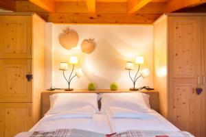 Postel nebo postele na pokoji v ubytování Bio Agritur Le Millemele