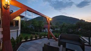 a balcony with a view of a mountain at Holiday Residence Šehić in Visoko