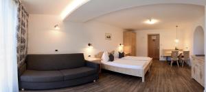 Postel nebo postele na pokoji v ubytování Residence Rautal B&B ***S