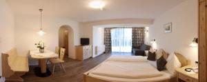 Postel nebo postele na pokoji v ubytování Residence Rautal B&B ***S