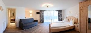 Postel nebo postele na pokoji v ubytování Residence Rautal B&B ***S