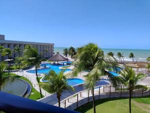 an aerial view of the pool at the resort at Hotel pirâmide natal in Natal