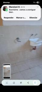 a screenshot of a website with a picture of a toilet at Casa céntrica de 2 dormitorios in Cañada de Gómez +30 photos